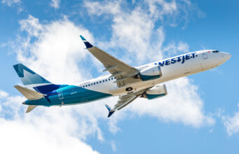 WestJet Boeing 737 gets stuck on SXM runway after landing WestJet Airline